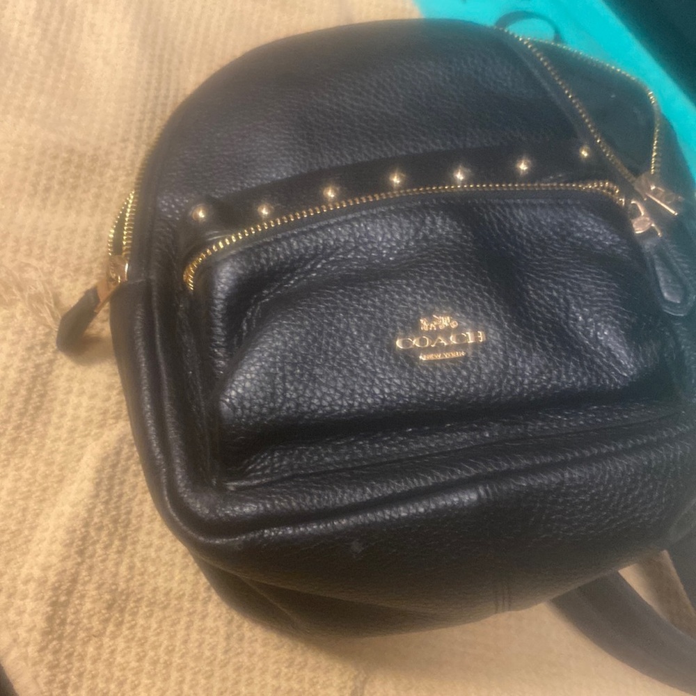 Small coach mini back pack carried only a few times well cared for